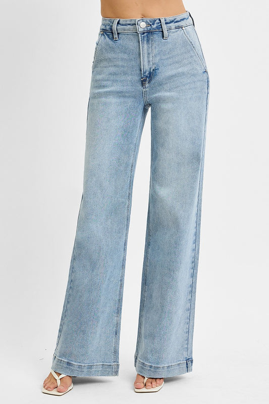 Classic denim meets modern style in these high-rise wide-leg jeans featuring flattering slanted front pockets and an effortlessly chic silhouette.
