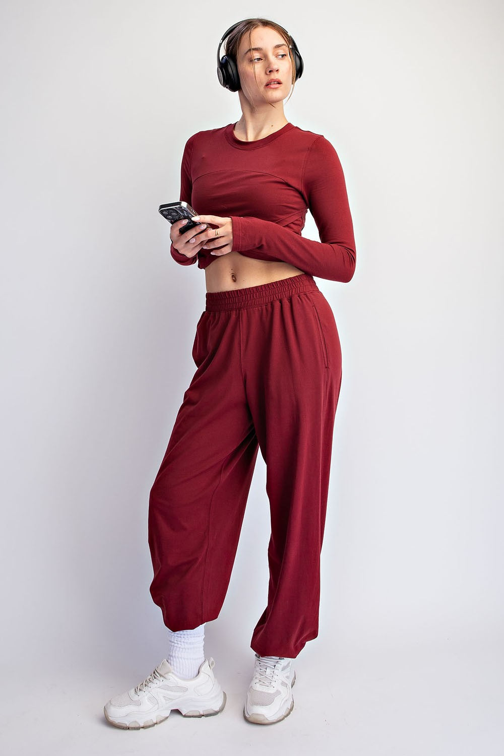 A soft, breathable cotton Lycra two-piece set featuring a cropped long sleeve top and relaxed ankle-length pants for effortless comfort from active days to downtime.

